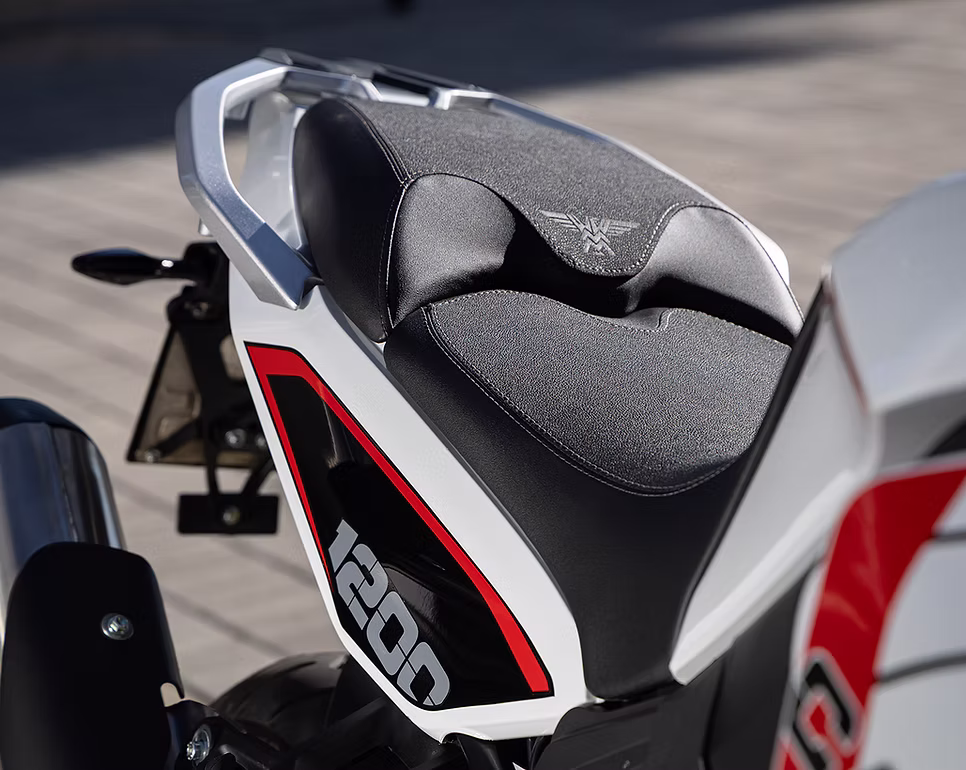 Both the rider seat and passenger feature premium padding, traction material, and heating. Passenger grab handles add to rider comfort and luggage stability.